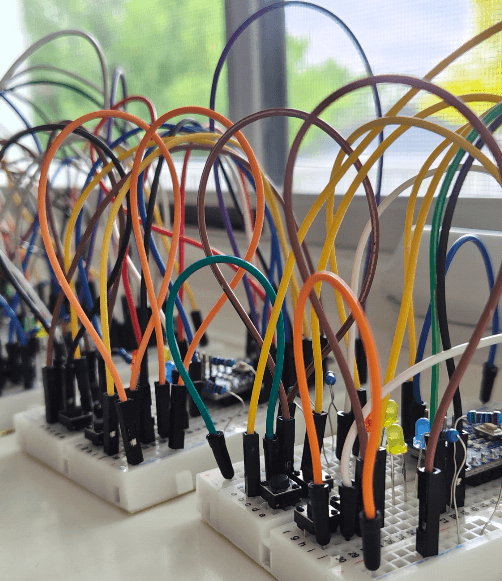 Student building circuits with Arduino microcontroller at Idaho Discovery Week electronics camp